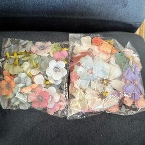 Lots of small and large fake flowers.